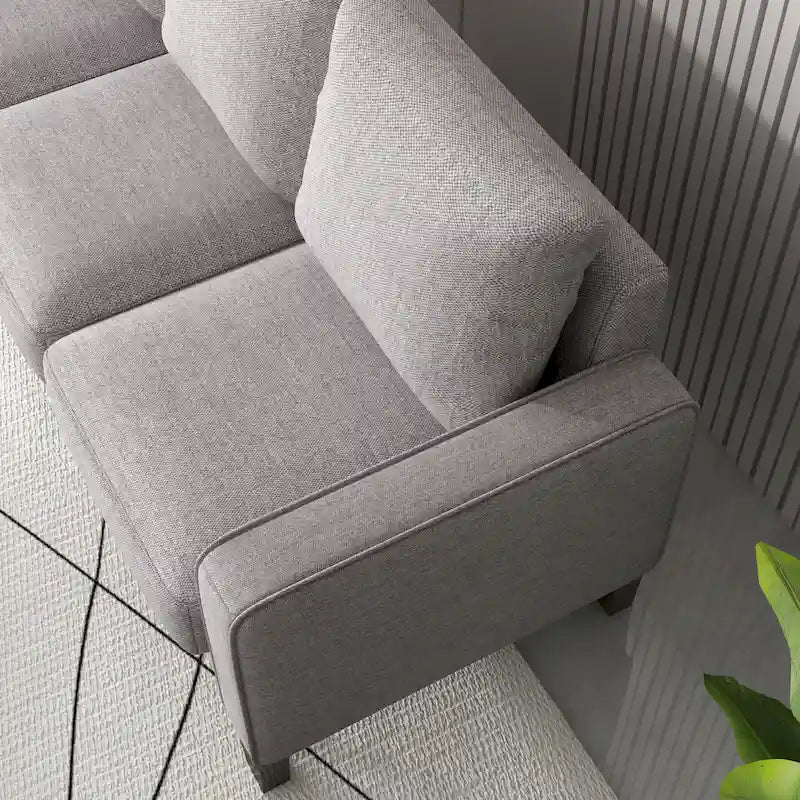 Canapé moderne en tissu trois places avec accoudoirs carrés et rangement sous l’assise