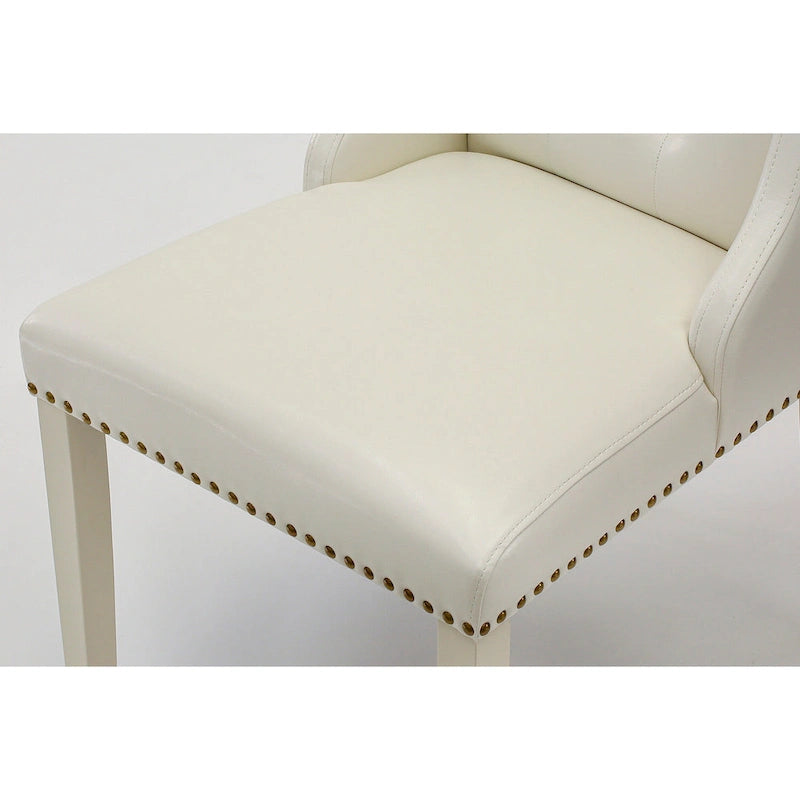 Elegante sedia da pranzo imbottita con bottoni capitonné e bordino decorativo con borchie