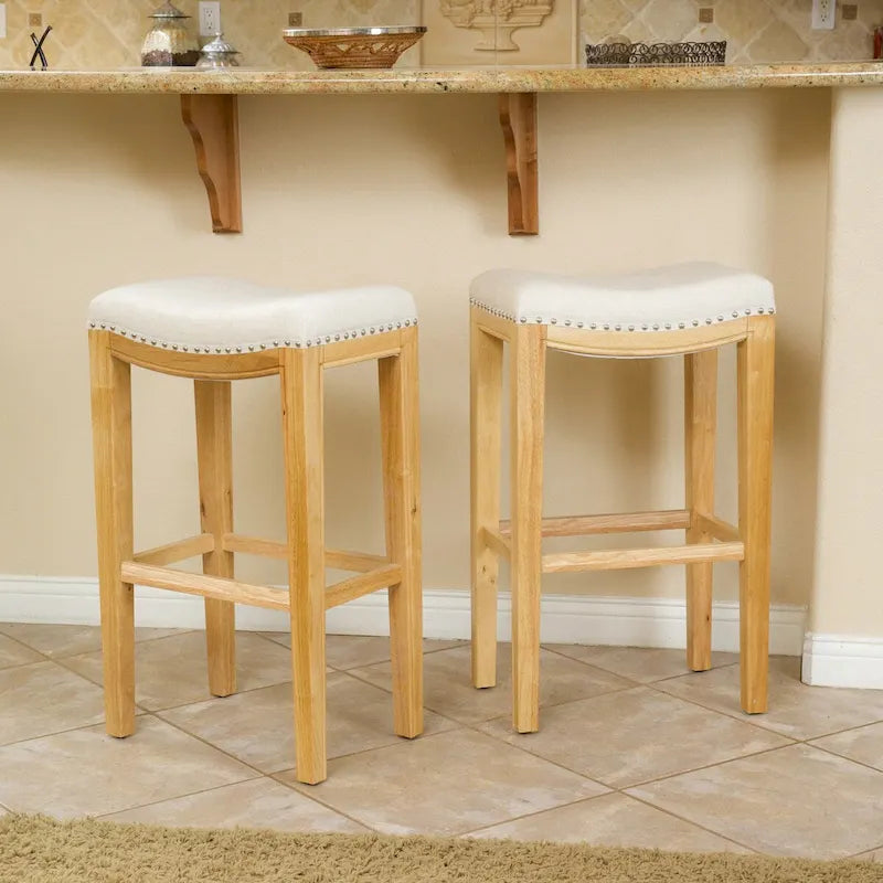 Upholstered Saddle Bar Stool with Wooden Frame and Nailhead Trim
