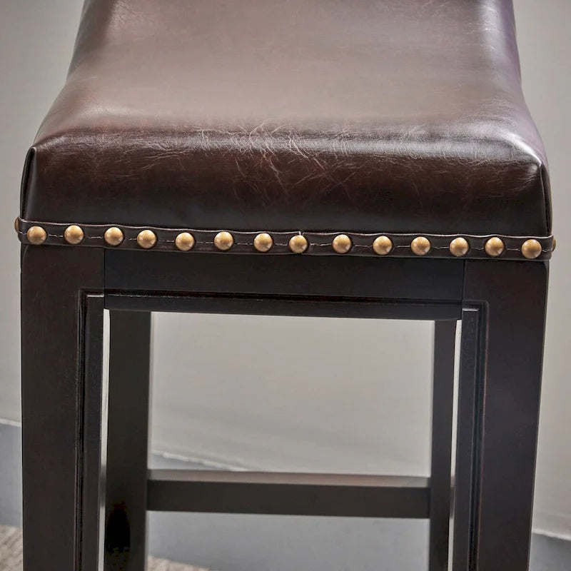 Upholstered Saddle Bar Stool with Wooden Frame and Nailhead Trim