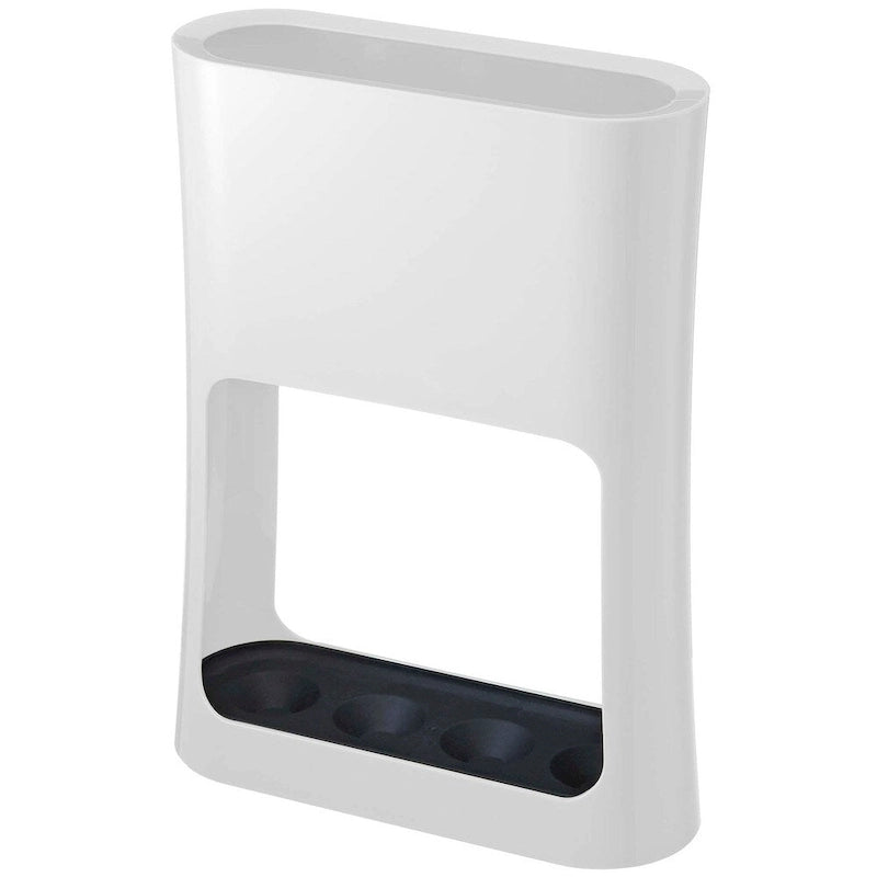 Porte-parapluies moderne ovale en acier pour rangement au sol dans une entrée compacte
